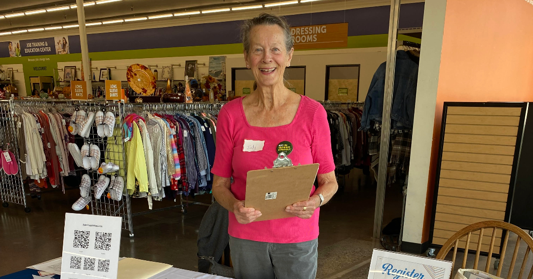 Judy Baker registering voters at Goodwill