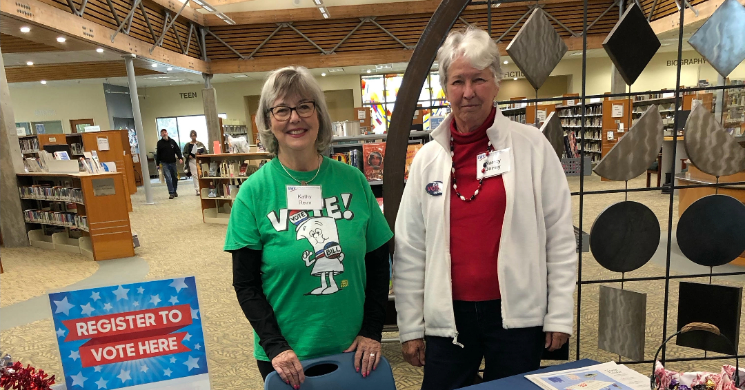 Nancy and Kathy registering voters